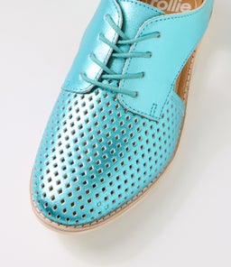 SIDECUT PUNCH TURQUOISE METALLIC LEATHER